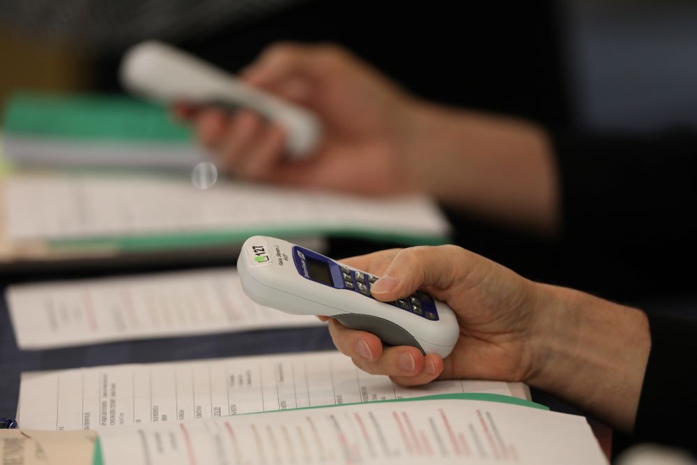 Bishops use electronic voting devices during the 2019 spring general assembly of the U.S. Conference of Catholic Bishops in Baltimore. (CNS/Bob Roller) 