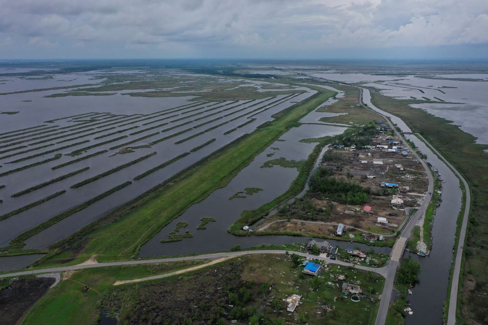 Dozens of homes along Bayou Pointe-au-Chien in southern Louisiana are left in ruins after Hurricane Ida made landfall in late August. (AP/Jessie Wardarski)