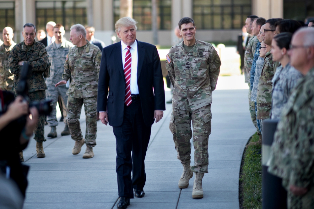 President Donald Trump and Gen. Joseph Votel meet with service members at MacDill Air Force Base in Florida in February. (Department of Defense/D. Myles Cullen) President Donald Trump and Gen. Joseph Votel meet with service members at MacDill Air Force Base in Florida in February. (Department of Defense/D. Myles Cullen)