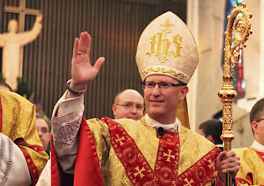 Bishop James Conley blesses the faithful Nov. 20, 2012, as he leaves the Cathedral of the Risen Christ in Lincoln, Nebraska, after his installation as bishop of Lincoln. (CNS/Southern Nebraska Register/Courtesy of Kevin Clark) Bishop James Conley blesses the faithful Nov. 20, 2012, as he leaves the Cathedral of the Risen Christ in Lincoln, Nebraska, after his installation as bishop of Lincoln. (CNS/Southern Nebraska Register/Courtesy of Kevin Clark)