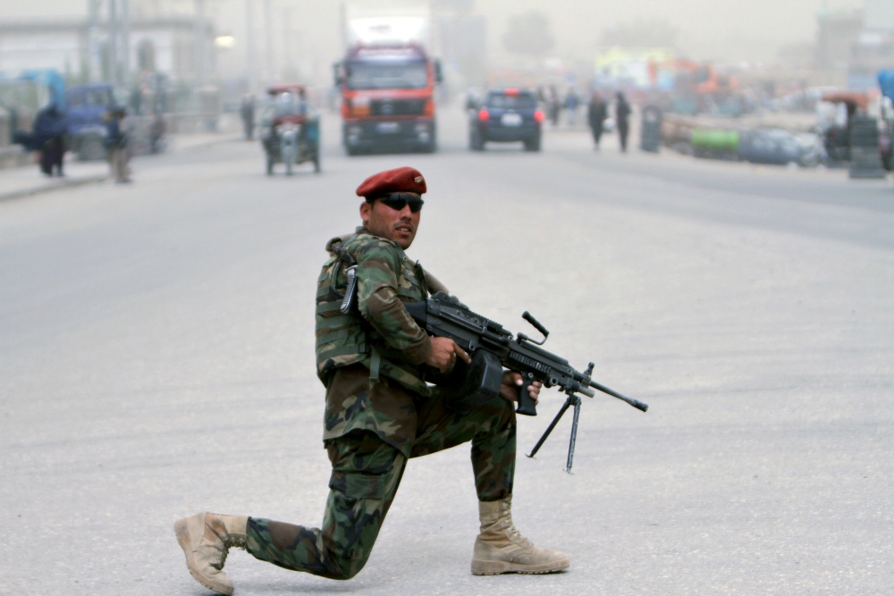 An Afghan soldier stands guard on a roadside in Ghazni, Afghanistan, April 22. (CNS/EPA/Ghulam Mustafa) An Afghan soldier stands guard on a roadside in Ghazni, Afghanistan, April 22. (CNS/EPA/Ghulam Mustafa)