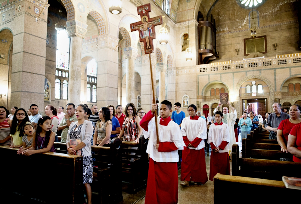 Catholics at the Shrine of the Sacred Heart in Washington, D.C., attend Mass for the feast of the Assumption Aug. 15. (CNS/Rhina Guidos)