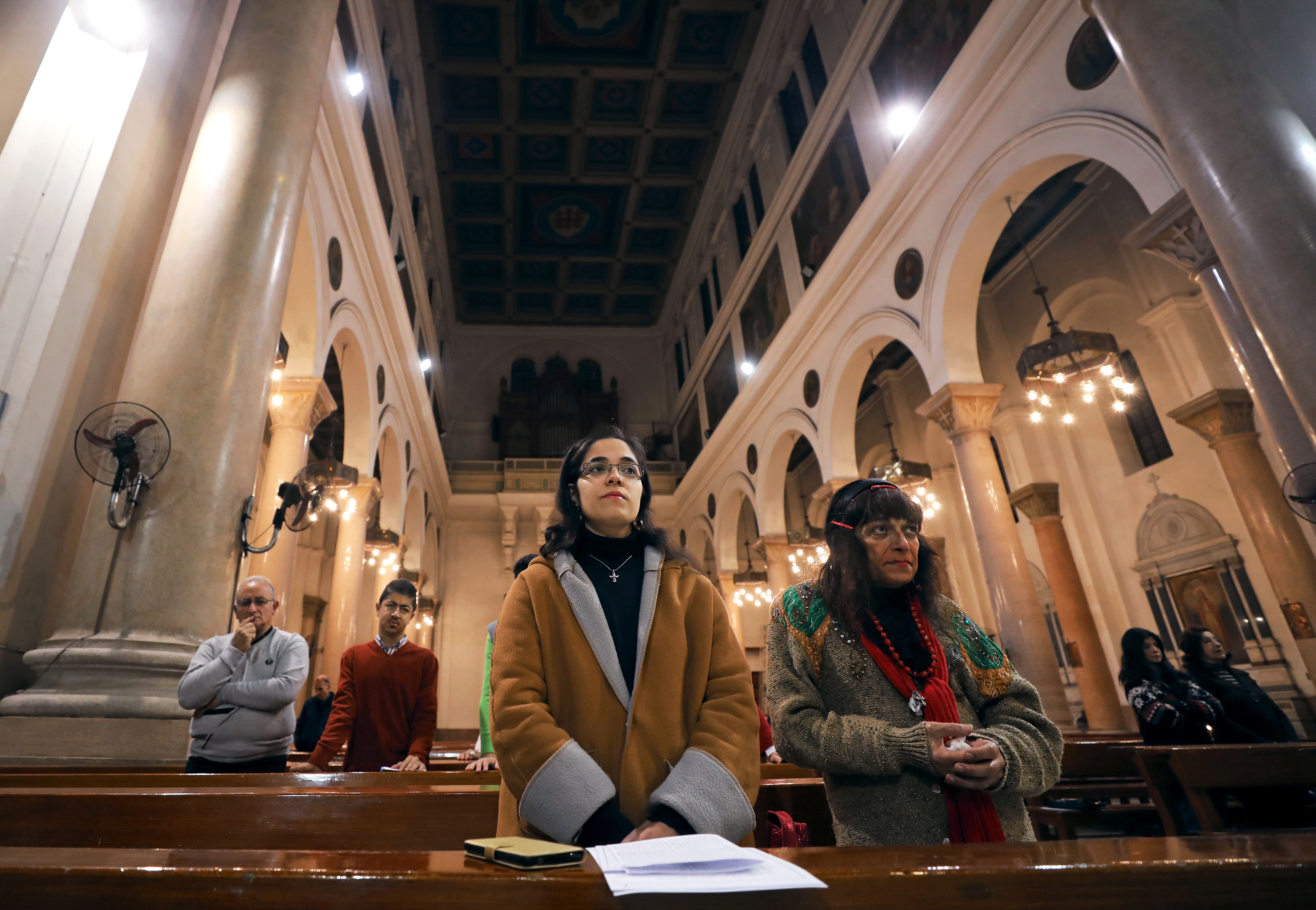 Worshippers pray during Mass on New Year's Eve at St. Joseph's Catholic Church in Cairo. (CNS photo/Mohamed Abd El Ghany, Reuters)