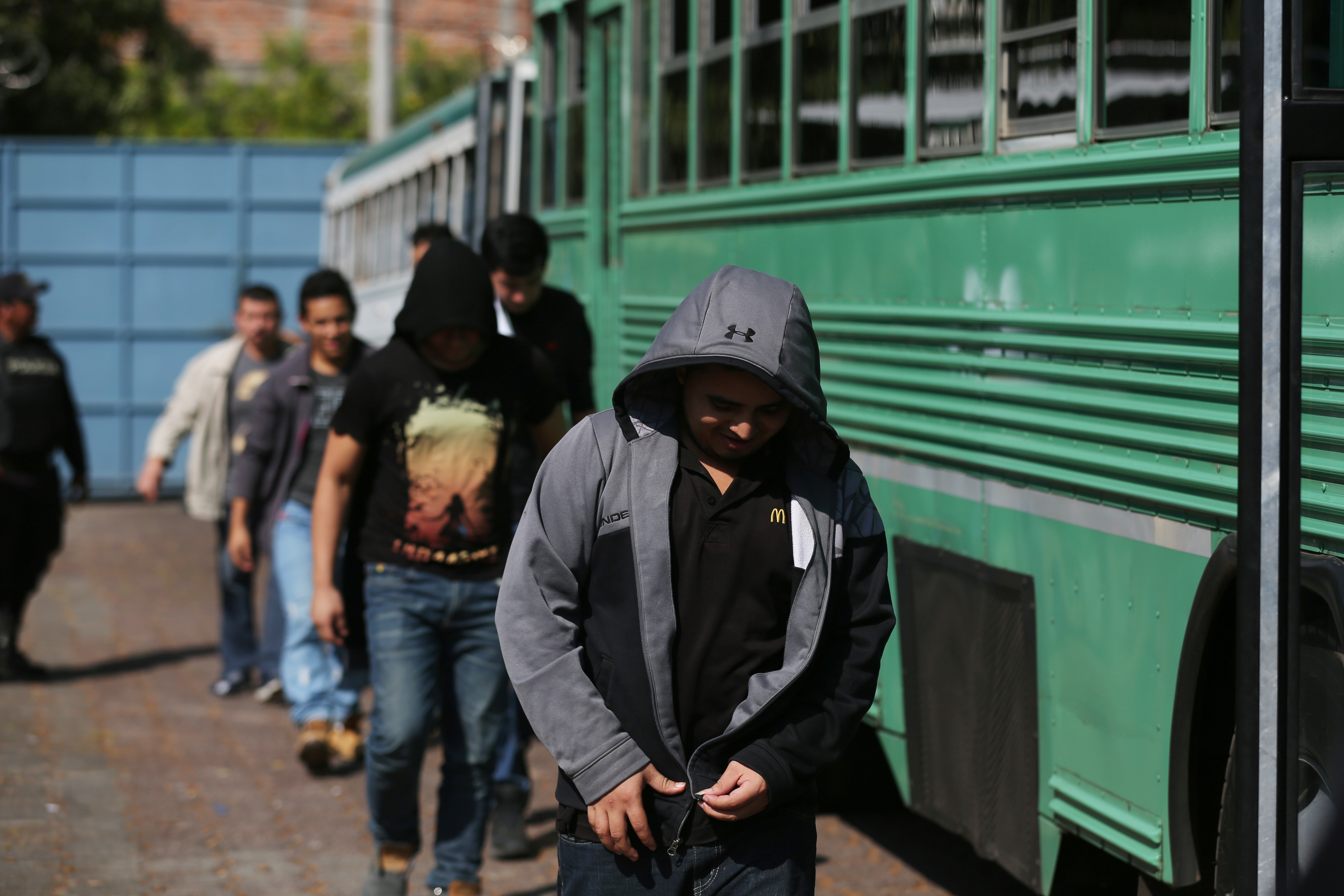 Deportees get off a bus at an immigration facility Jan. 11 after a flight arrived in San Salvador, El Salvador, with immigrants who were in the U.S. without documents. U.N. officials said Jan. 12 that U.S. President Donald Trump's reported use of an exple Deportees get off a bus at an immigration facility Jan. 11 after a flight arrived in San Salvador, El Salvador, with immigrants who were in the U.S. without documents. U.N. officials said Jan. 12 that U.S. President Donald Trump's reported use of an exple