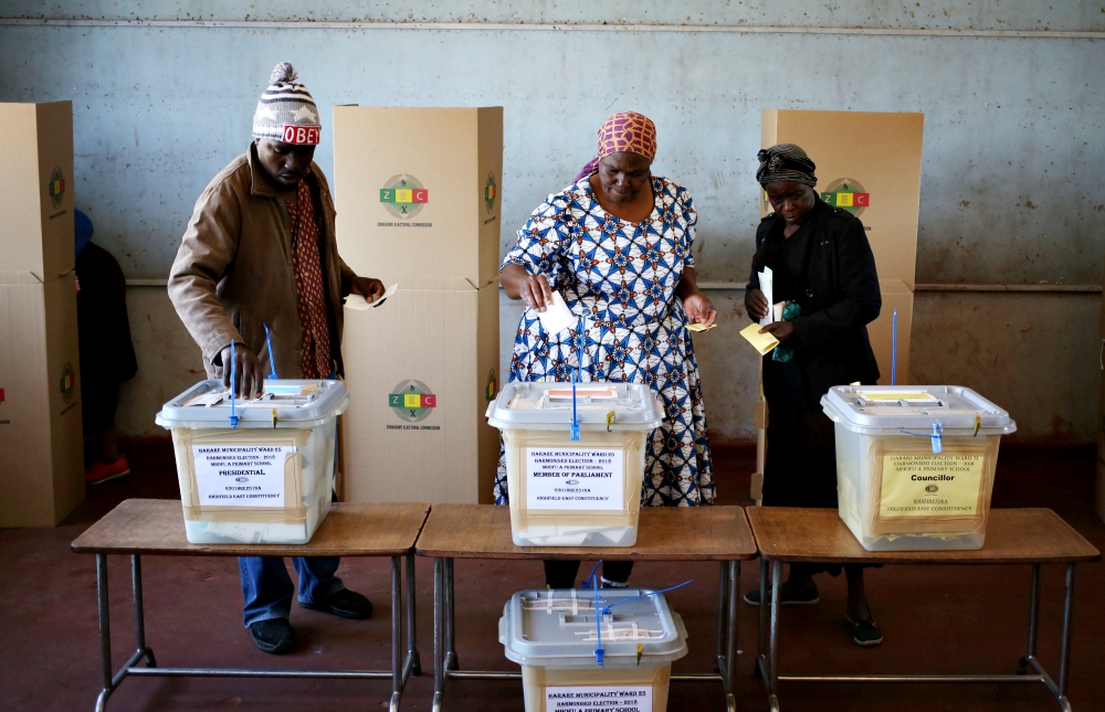 People cast their ballots in Zimbabwe's general elections July 30 in Harare. (CNS/Reuters/Siphiwe Sibeko) People cast their ballots in Zimbabwe's general elections July 30 in Harare. (CNS/Reuters/Siphiwe Sibeko)