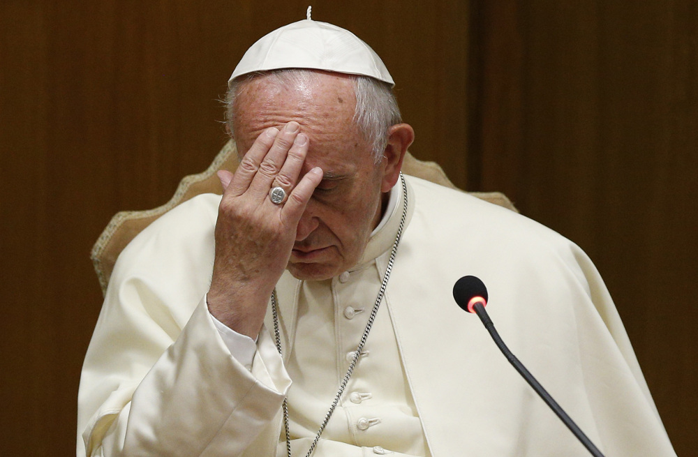 Pope Francis gestures before speaking about the death penalty at an event marking the 25th anniversary of the Catechism of the Catholic Church, at the Vatican in this Oct. 11, 2017, file photo. The pope ordered a revision to the catechism to state that th