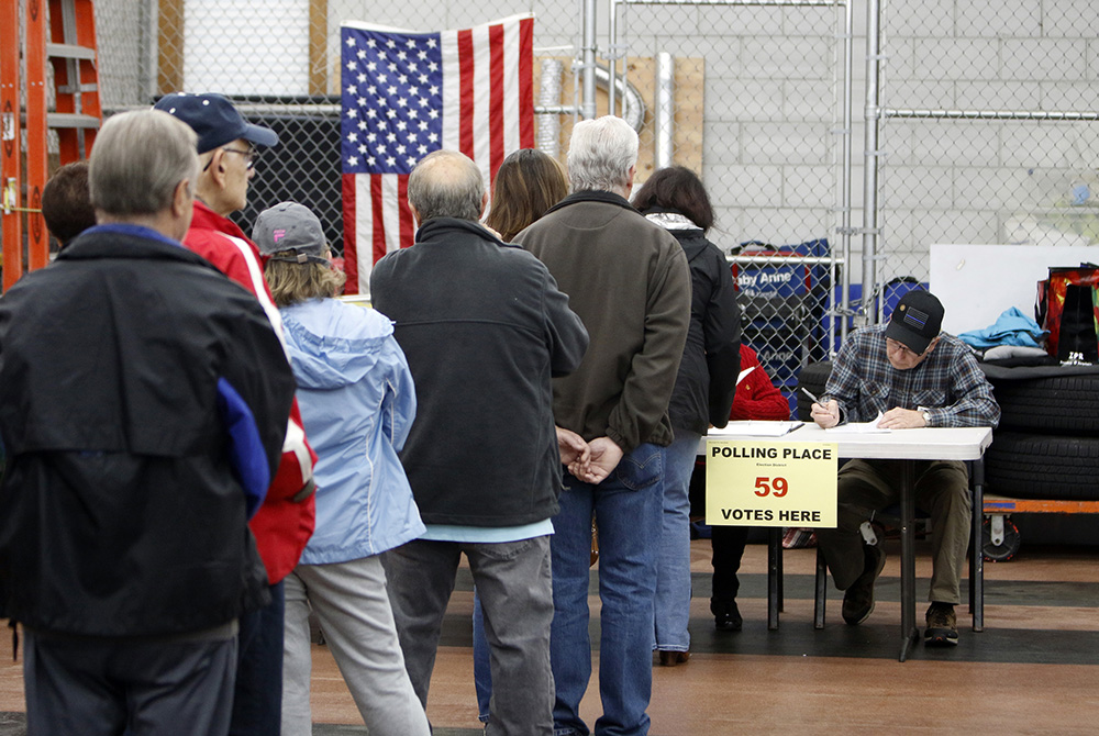 Voters line up prior to casting ballots Voters line up prior to casting their ballots Nov. 6, 2018, at a polling station in Nesconset, New York, on Election Day . (CNS/Gregory A. Shemitz)