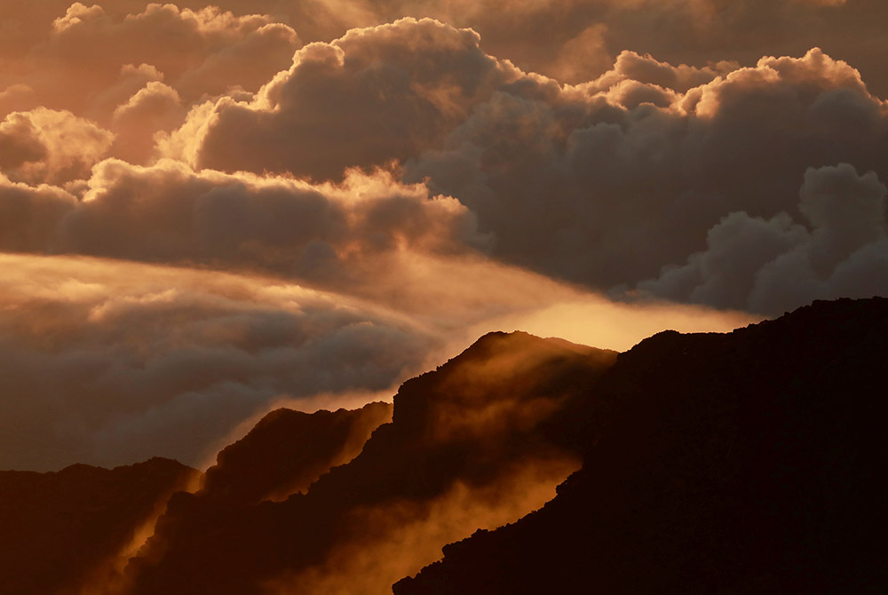 Light illuminates a crater during the sunrise at Haleakala National Park on the Hawaiian island of Maui Oct. 9, 2018. (CNS/Navesh Chitrakar, Reuters)