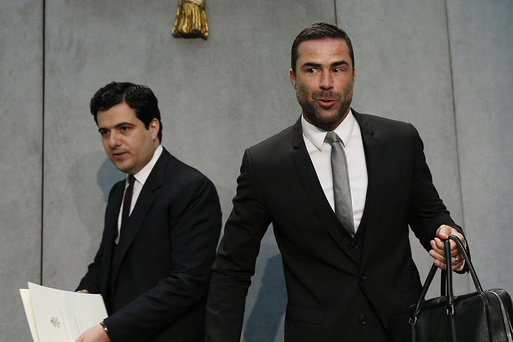 Tommaso Di Ruzza, left, then director of the Financial Intelligence Authority, and René Brülhart, then president of the same Vatican office, arrive for a news conference at the Vatican April 28, 2016. (CNS/Paul Haring)