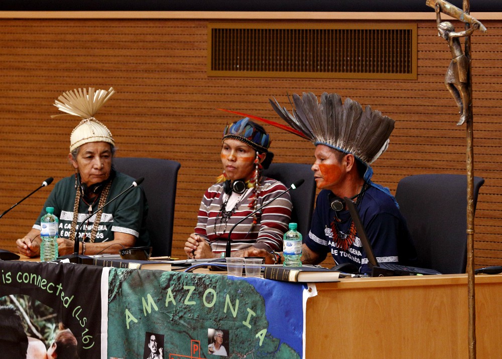 Dona Zenilda with the Xucuru people; Ednamar de Oliveira Viana, a leader of the Satere-Mawe people; and Francisco Chagas Chafre de Souza, a leader of the Apurina, all three from Brazil (CNS/Paul Haring)