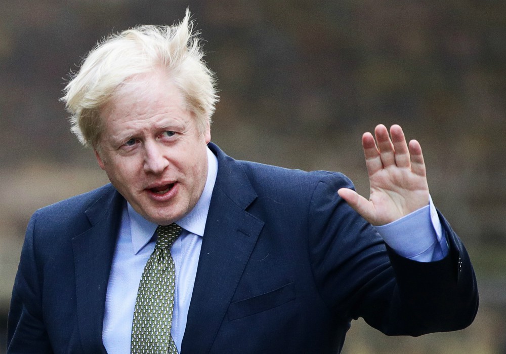 British Prime Minister Boris Johnson waves after meeting with Queen Elizabeth in London to ask for permission to form a government Dec. 13. (CNS/Reuters/Lisi Niesner) British Prime Minister Boris Johnson waves after meeting with Queen Elizabeth in London to ask for permission to form a government Dec. 13. (CNS/Reuters/Lisi Niesner)