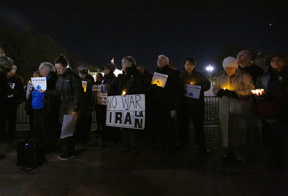 People gather Jan. 6 near the White House in Washington during a candlelight vigil to call for peaceful solutions to rising tensions between the United States and Iran. (CNS/Tyler Orsburn) People gather Jan. 6 near the White House in Washington during a candlelight vigil to call for peaceful solutions to rising tensions between the United States and Iran. (CNS/Tyler Orsburn)