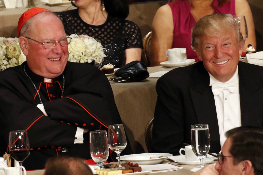 Cardinal Timothy Dolan and Donald Trump, then the Republican nominee for president, smile during the Alfred E. Smith Memorial Foundation Dinner in New York City Oct. 20, 2016. (CNS/Gregory A. Shemitz)