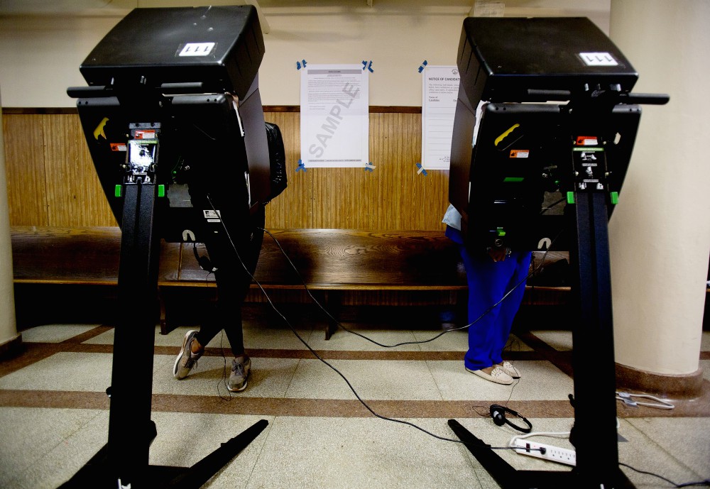 People vote in the John Bailey Room at St. Francis Xavier Church in Washington, D.C., Nov. 8, 2016. (CNS/Tyler Orsburn)