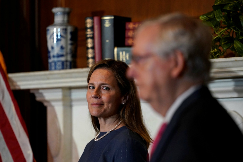 Judge Amy Coney Barrett, President Donald Trump's nominee for the U.S. Supreme Court, meets with Senate Majority Leader Mitch McConnell, R-Kentucky, on Capitol Hill in Washington Sept. 29. (CNS/Susan Walsh, Pool via Reuters) Judge Amy Coney Barrett, President Donald Trump's nominee for the U.S. Supreme Court, meets with Senate Majority Leader Mitch McConnell, R-Kentucky, on Capitol Hill in Washington Sept. 29. (CNS/Susan Walsh, Pool via Reuters)