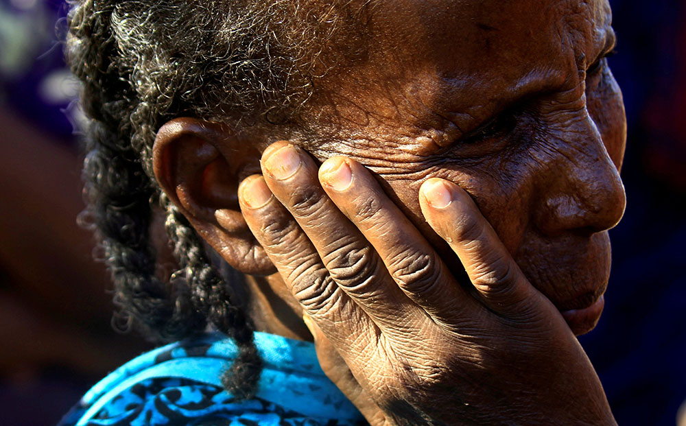 An Ethiopian woman who fled fighting in the Tigray region is seen at the Um-Rakoba refugee camp on the Sudan-Ethiopia border Dec. 13, 2020. (CNS/Reuters/Mohamed Nureldin Abdallah) An Ethiopian woman who fled fighting in the Tigray region is seen at the Um-Rakoba refugee camp on the Sudan-Ethiopia border Dec. 13, 2020. (CNS/Reuters/Mohamed Nureldin Abdallah)