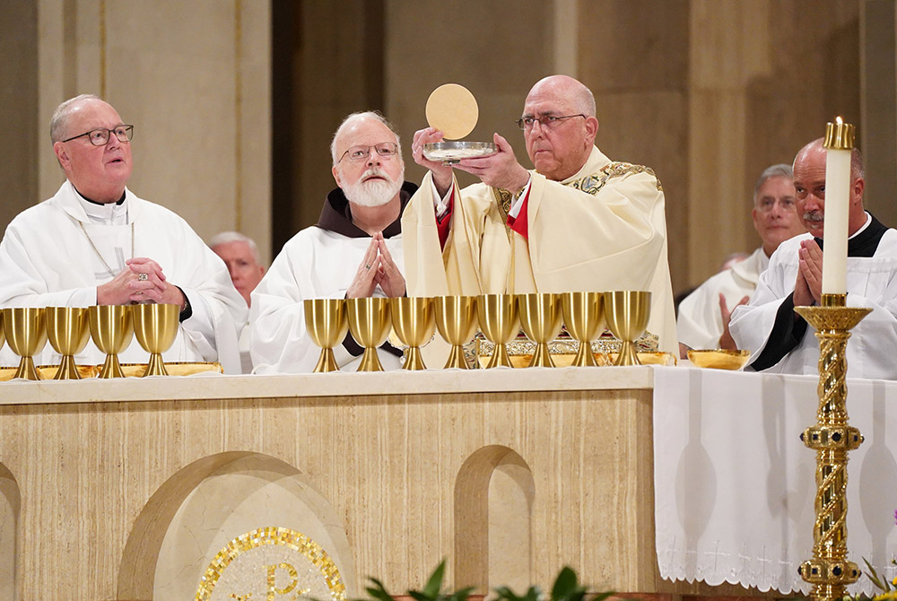 Cardinals Timothy Dolan of New York, left, Sean O'Malley of Boston, and Archbishop Joseph Naumann of Kansas City, Kansas, concelebrate the opening Mass of the National Prayer Vigil for Life Jan. 23, 2020, at the Basilica of the National Shrine of the Imma Cardinals Timothy Dolan of New York, left, Sean O'Malley of Boston, and Archbishop Joseph Naumann of Kansas City, Kansas, concelebrate the opening Mass of the National Prayer Vigil for Life Jan. 23, 2020, at the Basilica of the National Shrine of the Imma