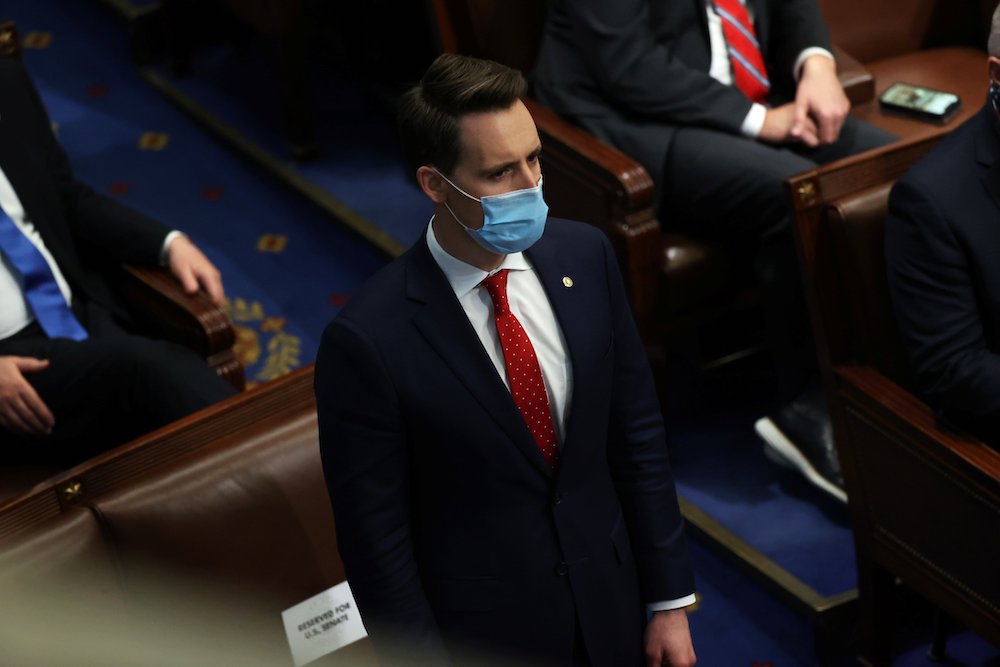 Josh Hawley Sen. Josh Hawley, R-Mo., stands to object to the Pennsylvania Electoral College vote a joint session of Congress in Washington Jan. 6. (CNS/Reuters/Jonathan Ernst)