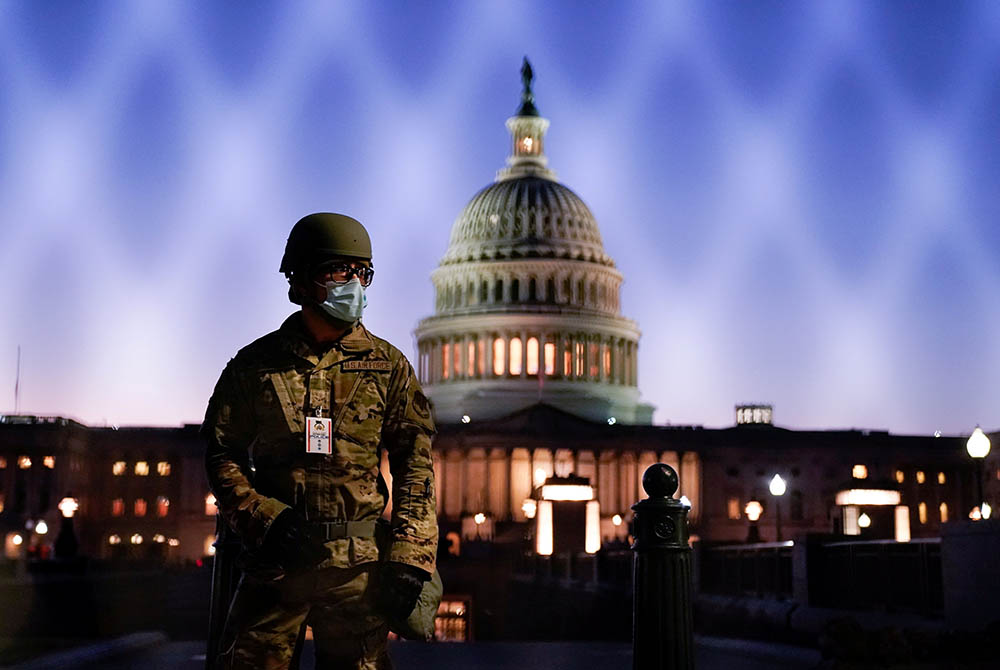 National Guard members gather at the U.S. Capitol Jan. 12, 2021, in Washington. (CNS/Erin Scott, Reuters) National Guard members gather at the U.S. Capitol Jan. 12, 2021, in Washington. (CNS/Erin Scott, Reuters)