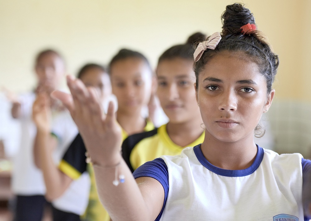 Young women practice a school play that recalls their troubled history in the Escola São João in Quilombo Tiningu, near Santarém, Brazil. 