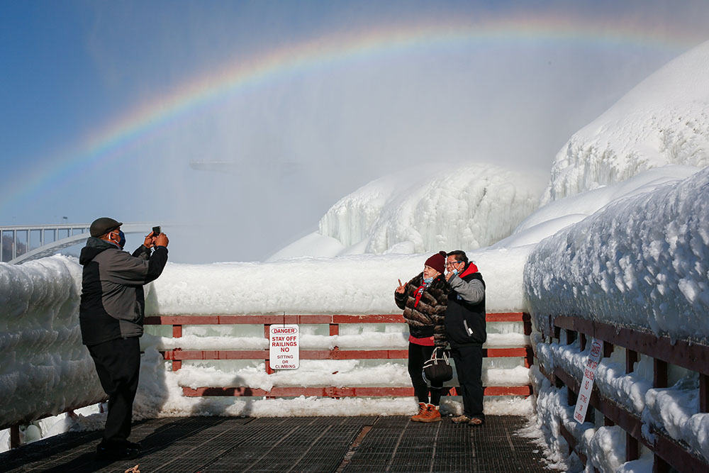 Visitors are photographed at the base of American Falls in Niagara Falls, New York, Feb. 21. (CNS/Reuters/Lindsay DeDario) Visitors are photographed at the base of American Falls in Niagara Falls, New York, Feb. 21. (CNS/Reuters/Lindsay DeDario)