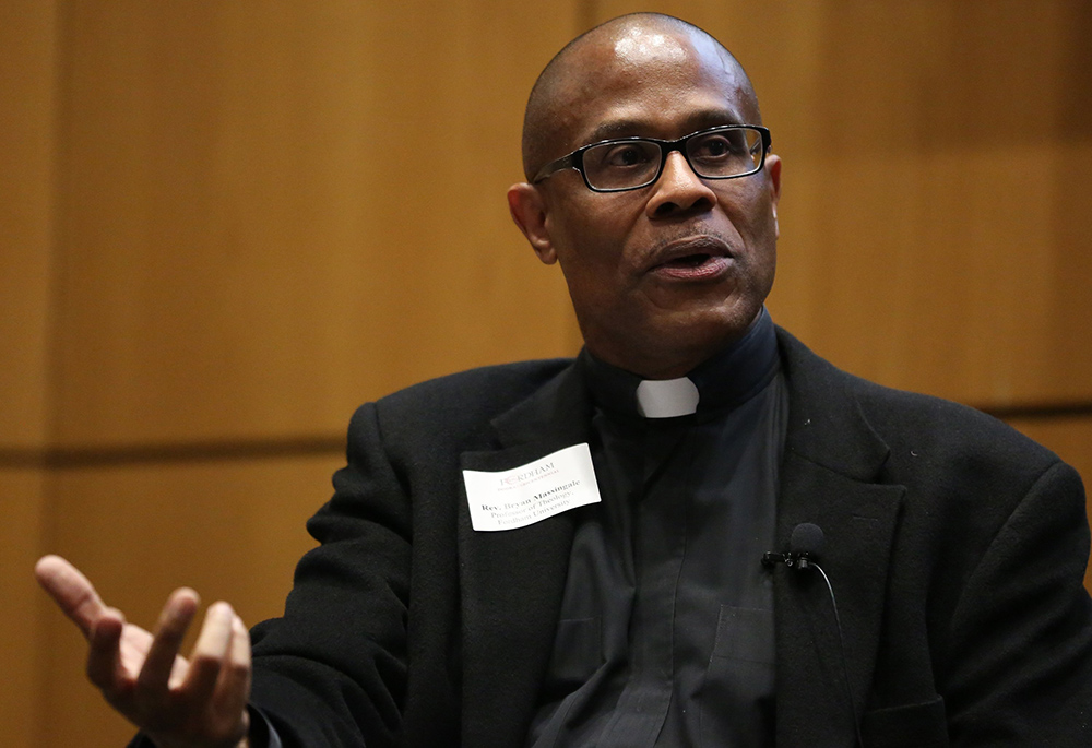 Fr. Bryan Massingale is seen during a 2017 panel discussion in New York. (CNS/Fordham University/Bruce Gilbert)