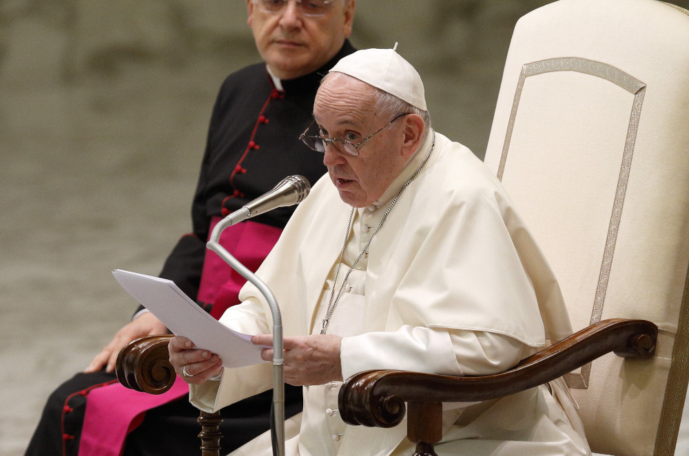 Pope Francis leads his general audience in the Paul VI hall at the Vatican Aug. 25. (CNS/Paul Haring)