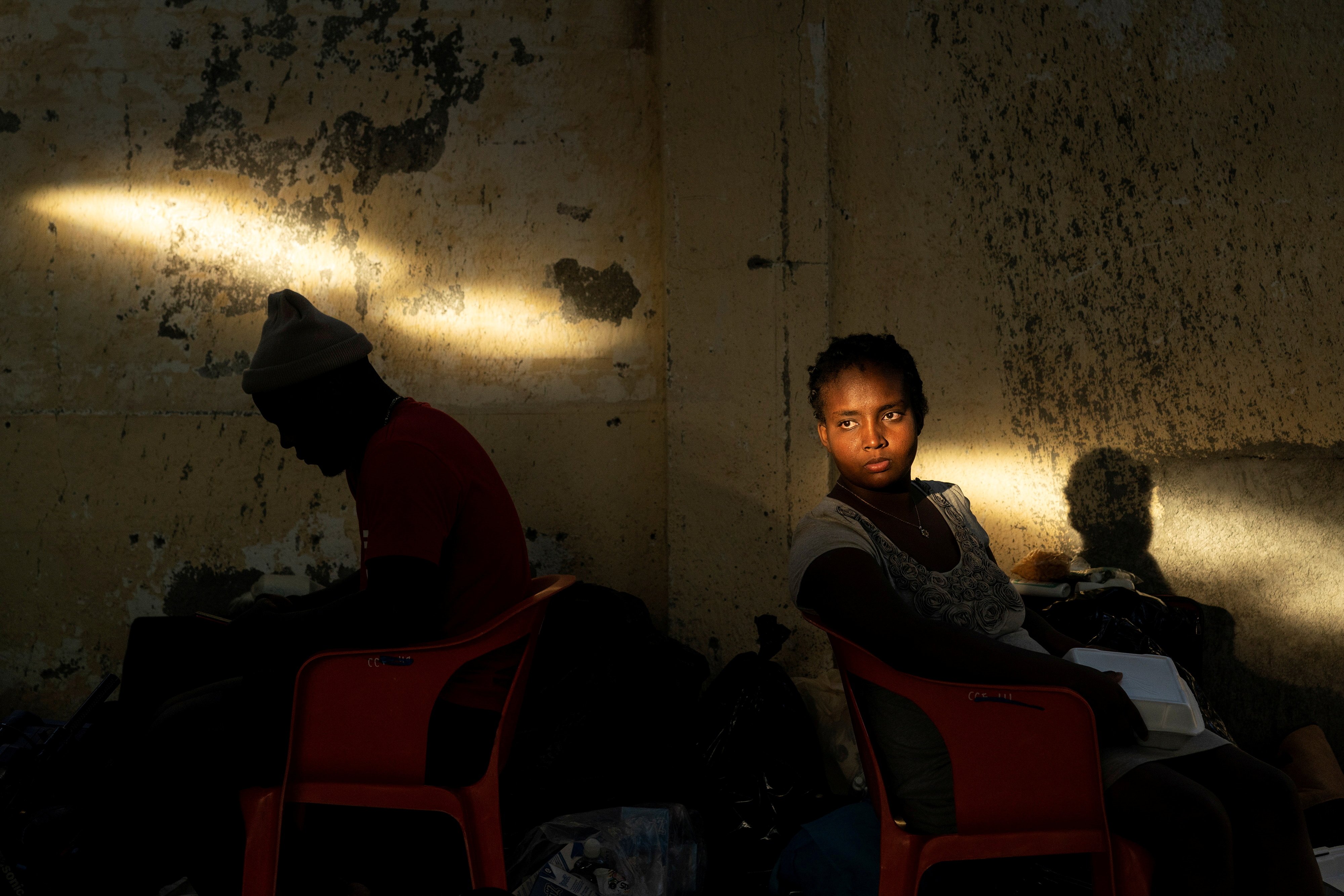 Migrants seeking asylum in the U.S., who returned to Mexican side of the border to avoid deportation, take shelter in Ciudad Acuna, Mexico, Sept. 24, 2021. (CNS photo/Go Nakamura, Reuters)