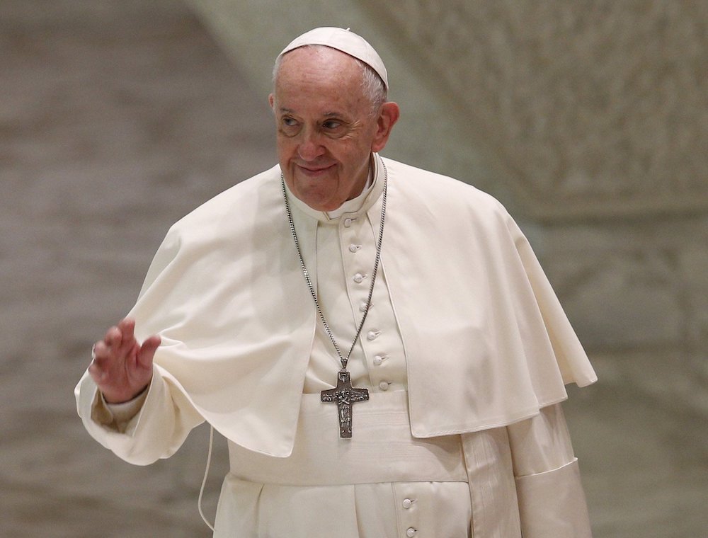 Pope Francis greets the crowd as he arrives for his general audience in the Paul VI hall at the Vatican Sept. 29. Pope Francis will not be attending the U.N. Climate Change Conference in Glasgow, Scotland, in November; Cardinal Pietro Parolin will head th