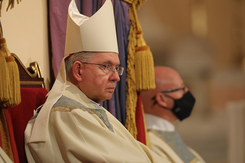 Los Angeles Archbishop José Gomez sits in the cathedra, or bishop's chair, as he concelebrates Mass at the Basilica of the National Shrine of the Assumption of the Blessed Virgin Mary Nov. 15 in Baltimore during the bishops' fall general assembly. (CNS)