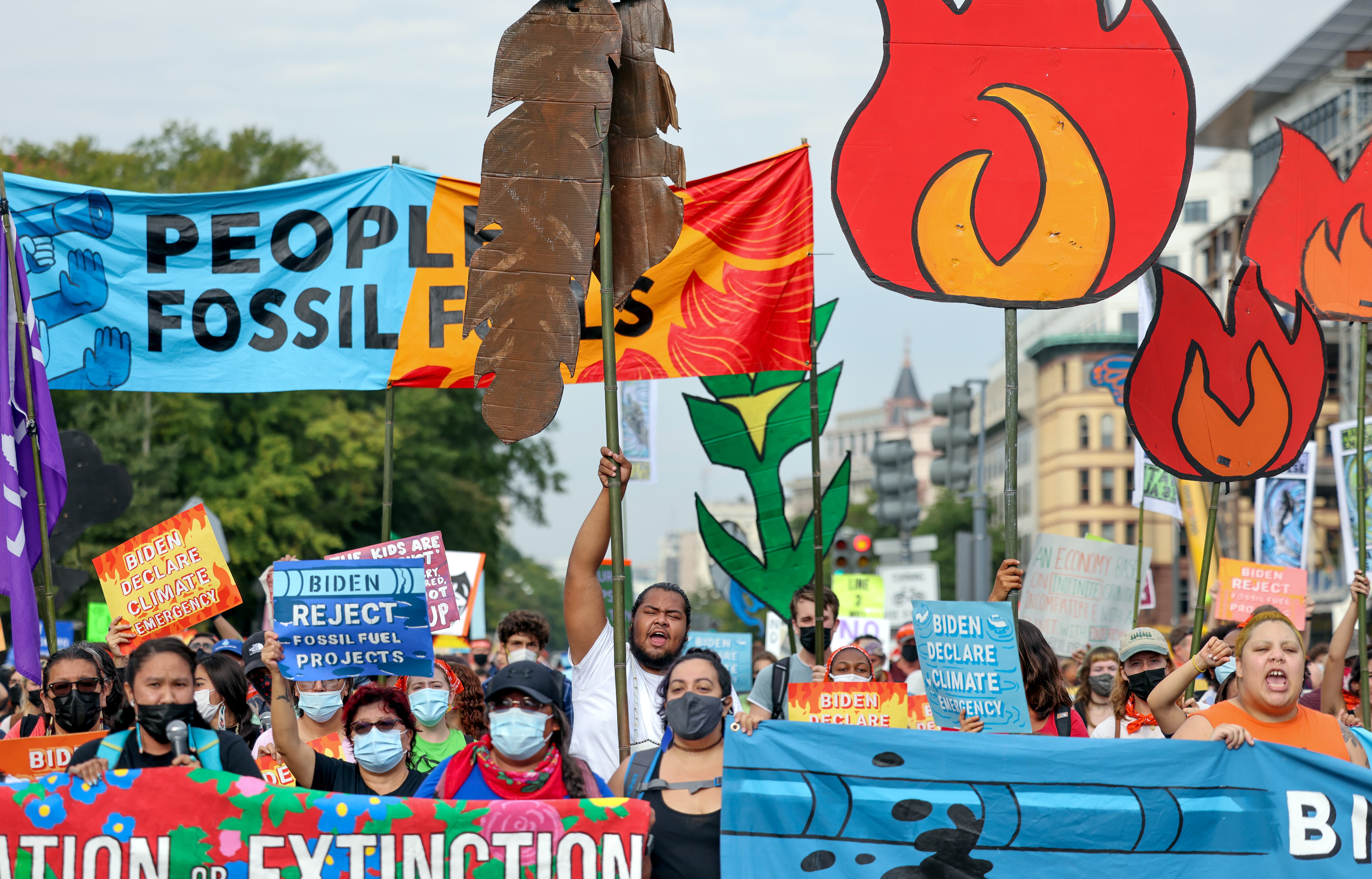 Young environmental activists march to the U.S. Capitol during a climate change protest in Washington, D.C., Oct. 15, 2021. Members of Gen Z, people born after 1996, generally consider climate change an existential crisis. (CNS/Reuters/Evelyn Hockstein)