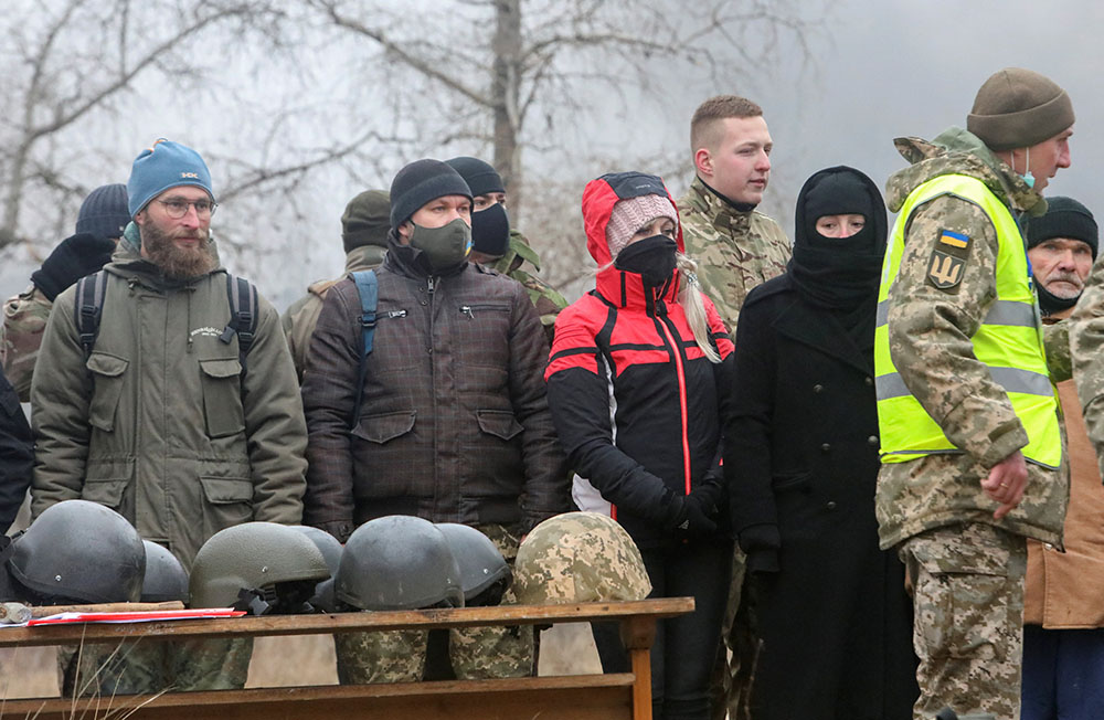 Reservists of the Ukrainian Territorial Defense Forces line up as they take part in military exercises at a training ground outside Kharkiv, Ukraine, Dec. 11, 2021. (CNS/Reuters/Vyacheslav Madiyevskyy)