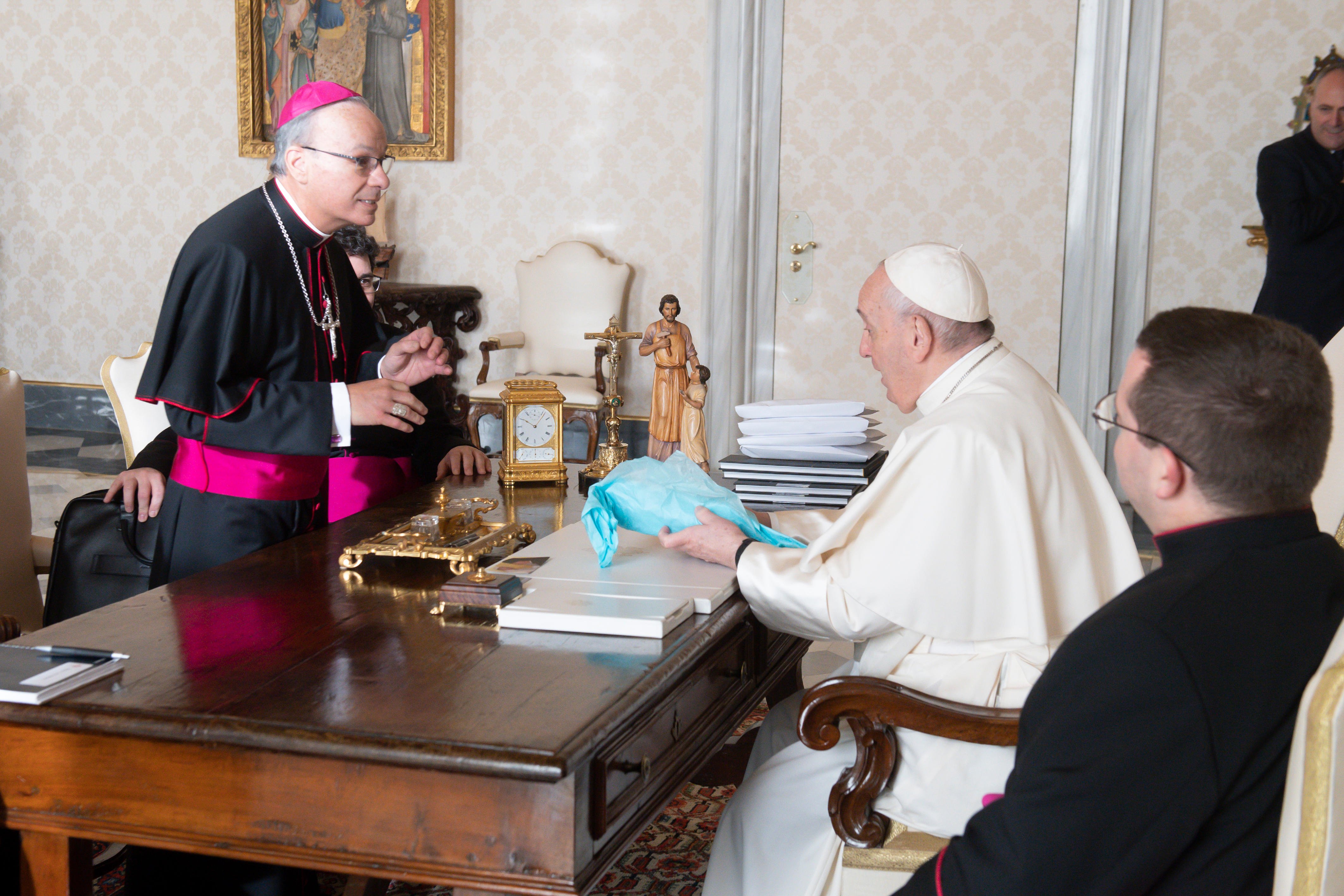 Pope Francis talks with Bishop Raymond Poisson of Saint-Jérôme and of Mont-Laurier, Quebec, president of the Canadian bishops' conference, during a meeting with officers of the conference at the Vatican Dec. 9, 2021. (CNS photo/Vatican Media)