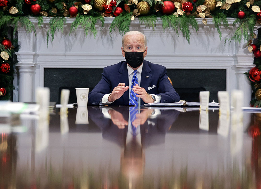 President Joe Biden meets with members of the White House COVID-19 Response Team from the White House in Washington Dec. 16, 2021, about the latest developments related to the Omicron variant. (CNS/Reuters/Evelyn Hockstein)