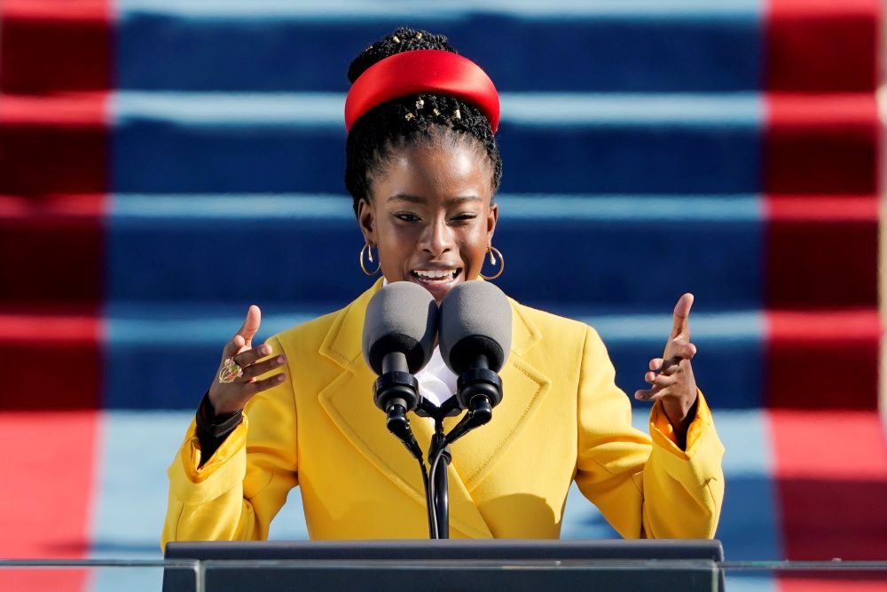 American poet Amanda Gorman reads a poem during Joe Biden's presidential inauguration Jan. 20, 2021. One line says: "There is always light, if only we're brave enough to see it." (CNS/Patrick Semansky, pool via Reuters)