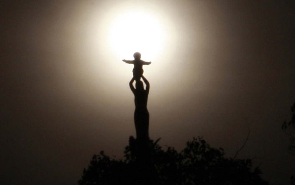 The statue of Our Lady of Sheshan is pictured in a file photo atop the minor basilica in her name in Shanghai. 