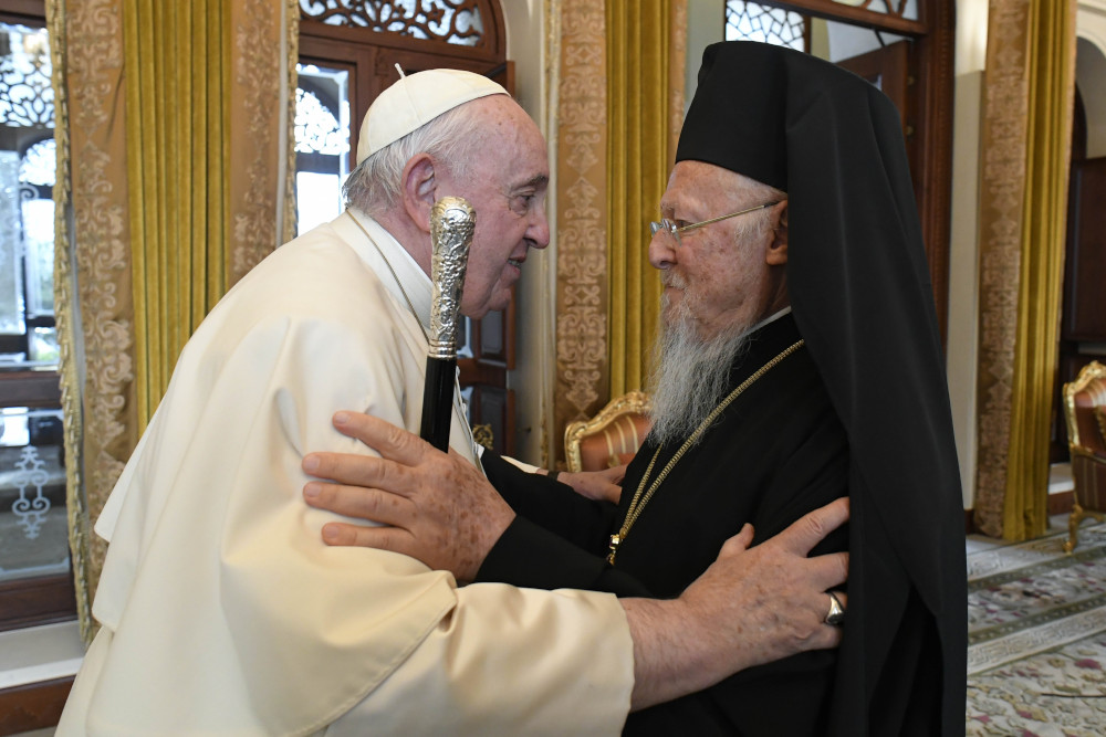 Pope Francis greets Ecumenical Patriarch Bartholomew of Constantinople at Sakhir Palace in Awali, Bahrain, in this Nov. 4, 2022, file photo. In a letter to Patriarch Bartholomew, Pope Francis said Christians must acknowledge how sin has exacerbated divisions and how growing in holiness is part of the search for Christian unity. (CNS photo/Vatican Media)