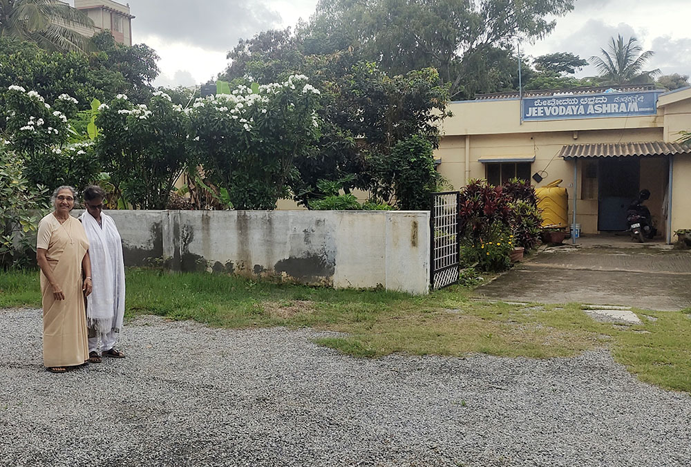 Holy Cross Sr. Fidelis Nedumpara (left) with Sr. Latika Pazhunkaran, a member of the Sisters of John the Baptist, on the campus of Jeevodaya Ashram in the southern Indian city of Bengaluru, where former prisoners and women in distress are sheltered (GSR photo/Thomas Scaria)