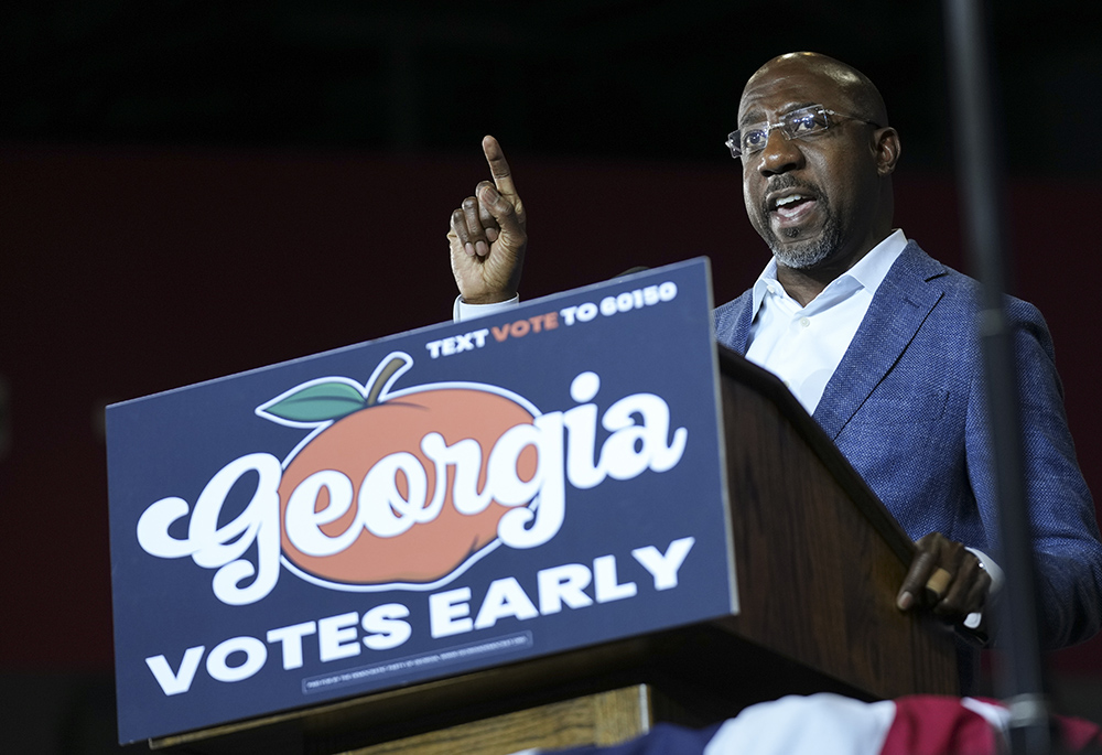 U.S. Sen. Raphael Warnock, D-Ga., candidate for U.S. Senate, speaks during a campaign rally Oct. 28, in College Park, Georgia. (AP photo/John Bazemore)