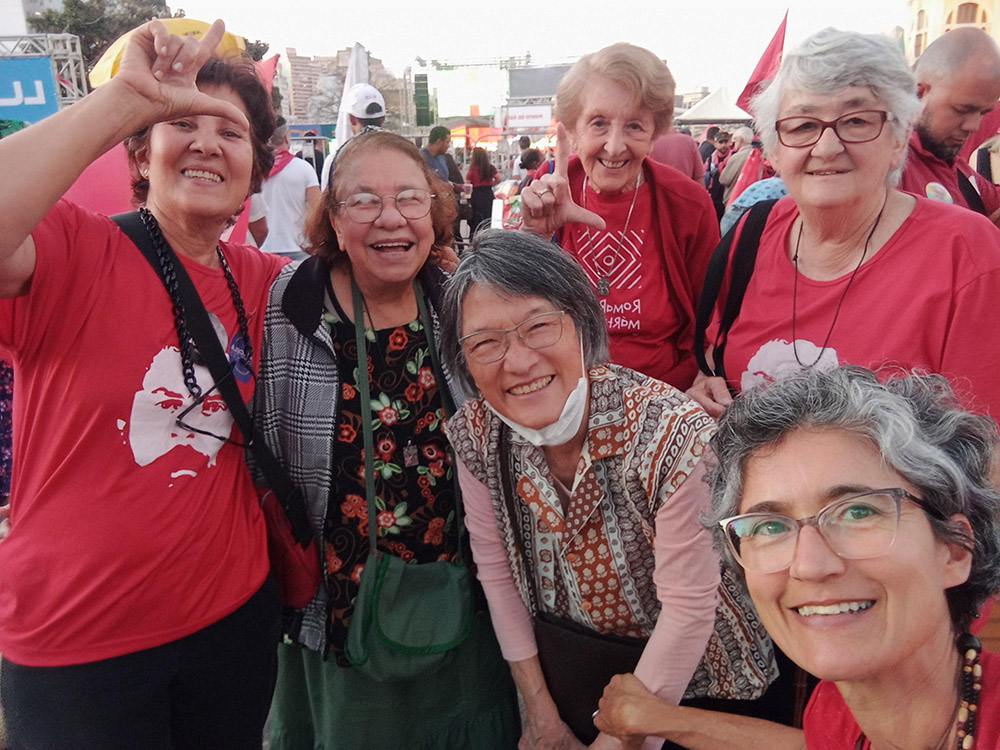 Some sisters of the community of the Carmelites of Charity of Vedruna, in Belo Horizonte, Brazil, meet Nov. 3 to evaluate their actions in the electoral campaign. Red is the color of the Workers' Party — the color of the party that elected Luiz Inácio Lula da Silva president. (Virma Barion)