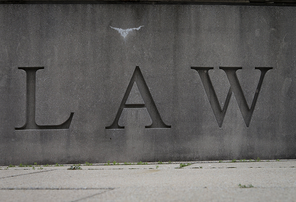 Signage is seen on the Catholic University of America's Columbus School of Law building in Washington. Associate Justice Samuel Alito gave the inaugural lecture for the Project on Constitutional Originalism and the Catholic Intellectual Tradition, a new program housed within the law school. (CNS/Tyler Orsburn)