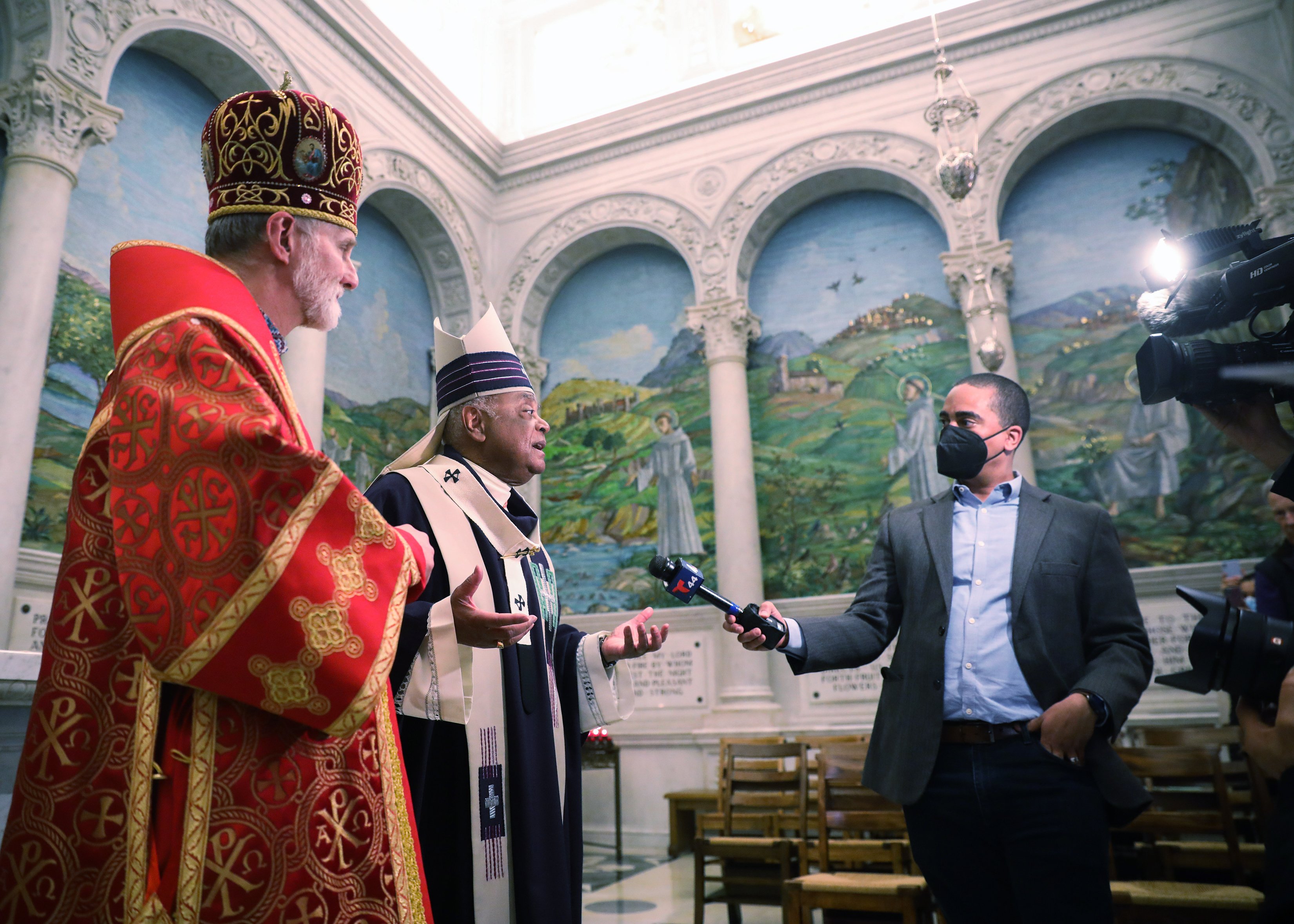 Washington Cardinal Wilton D. Gregory responds to reporters after an Ash Wednesday Mass at St. Matthew's Cathedral in Washington March 2, 2022. Also pictured is Archbishop Borys Gudziak of the Ukrainian Catholic Archeparchy of Philadelphia. (CNS photo)