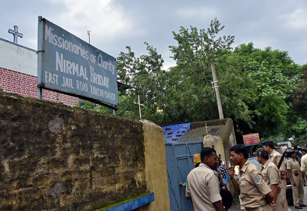 Police stand outside a Missionaries of Charity home that provides shelter for pregnant unmarried women in Ranchi, India, on July 4, 2018. (CNS/Reuters)