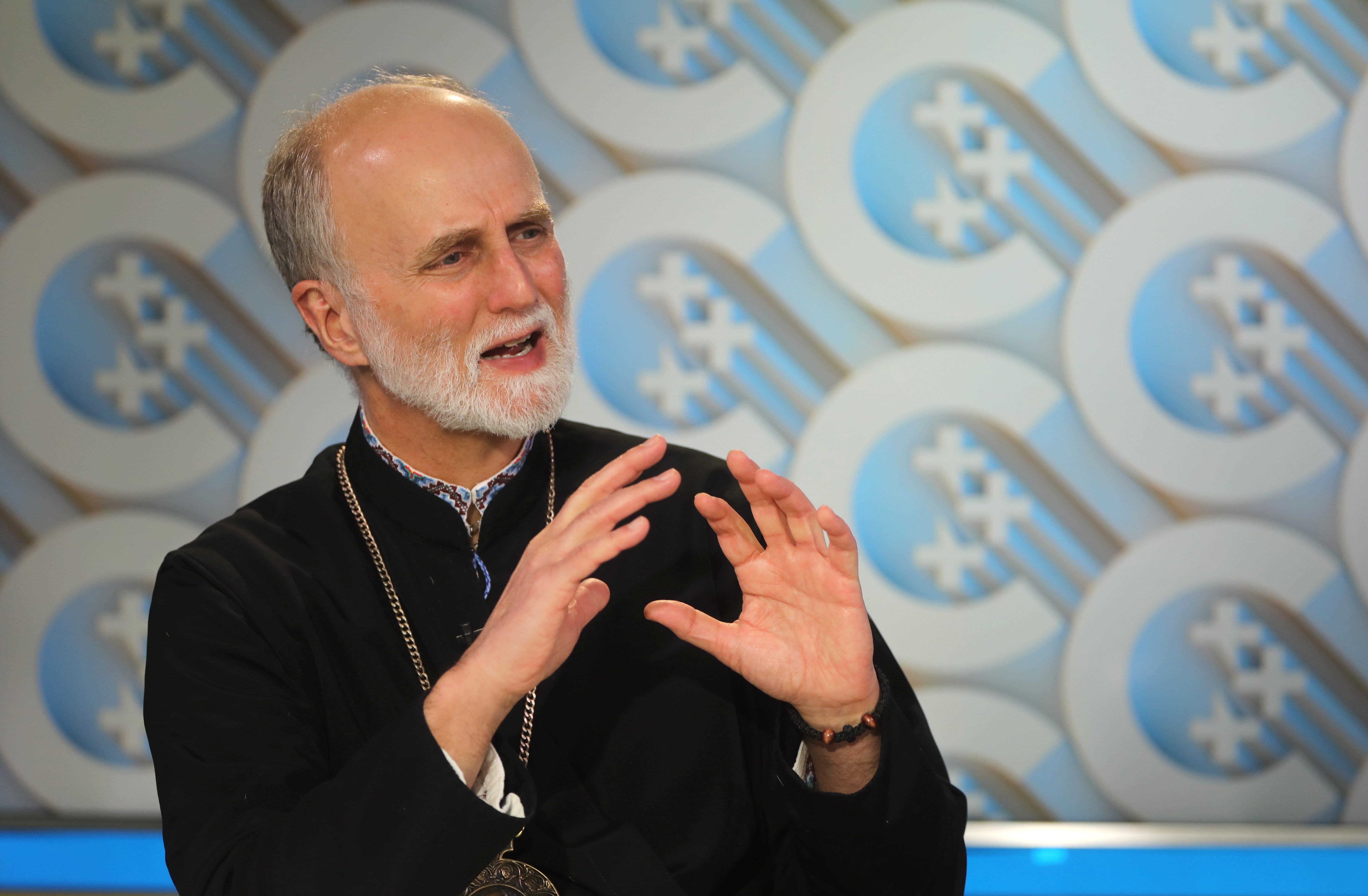 Archbishop Borys Gudziak of the Ukrainian Catholic Archdiocese of Philadelphia gestures during an interview with Catholic News Service at the headquarters of the U.S. Conference of Catholic Bishops March 14, 2022, in Washington. (CNS photo/Bob Roller)