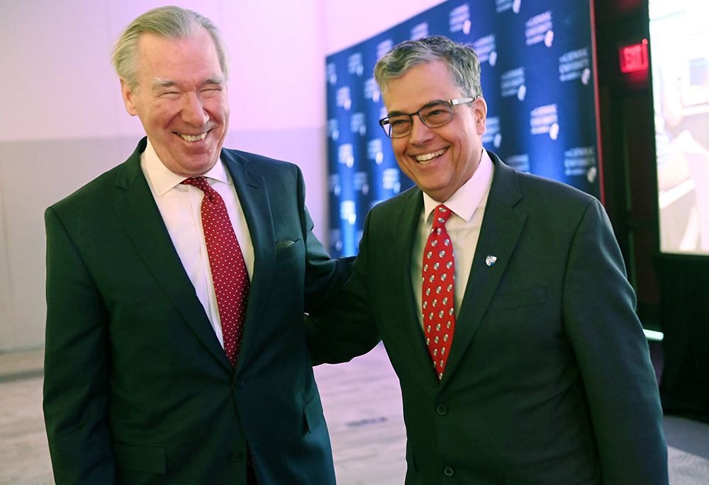 John Garvey, president of the Catholic University of America in Washington, left, and Peter Kilpatrick are seen on campus March 29. (CNS/Catholic University of America/Patrick G. Ryan)