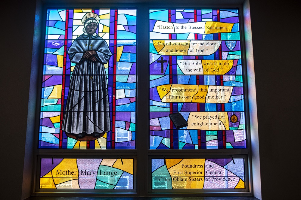 An image of Mother Mary Lange, foundress of the Oblate Sisters of Providence, in a stained-glass window in the chapel of the religious order's motherhouse near Baltimore (CNS/Chaz Muth)