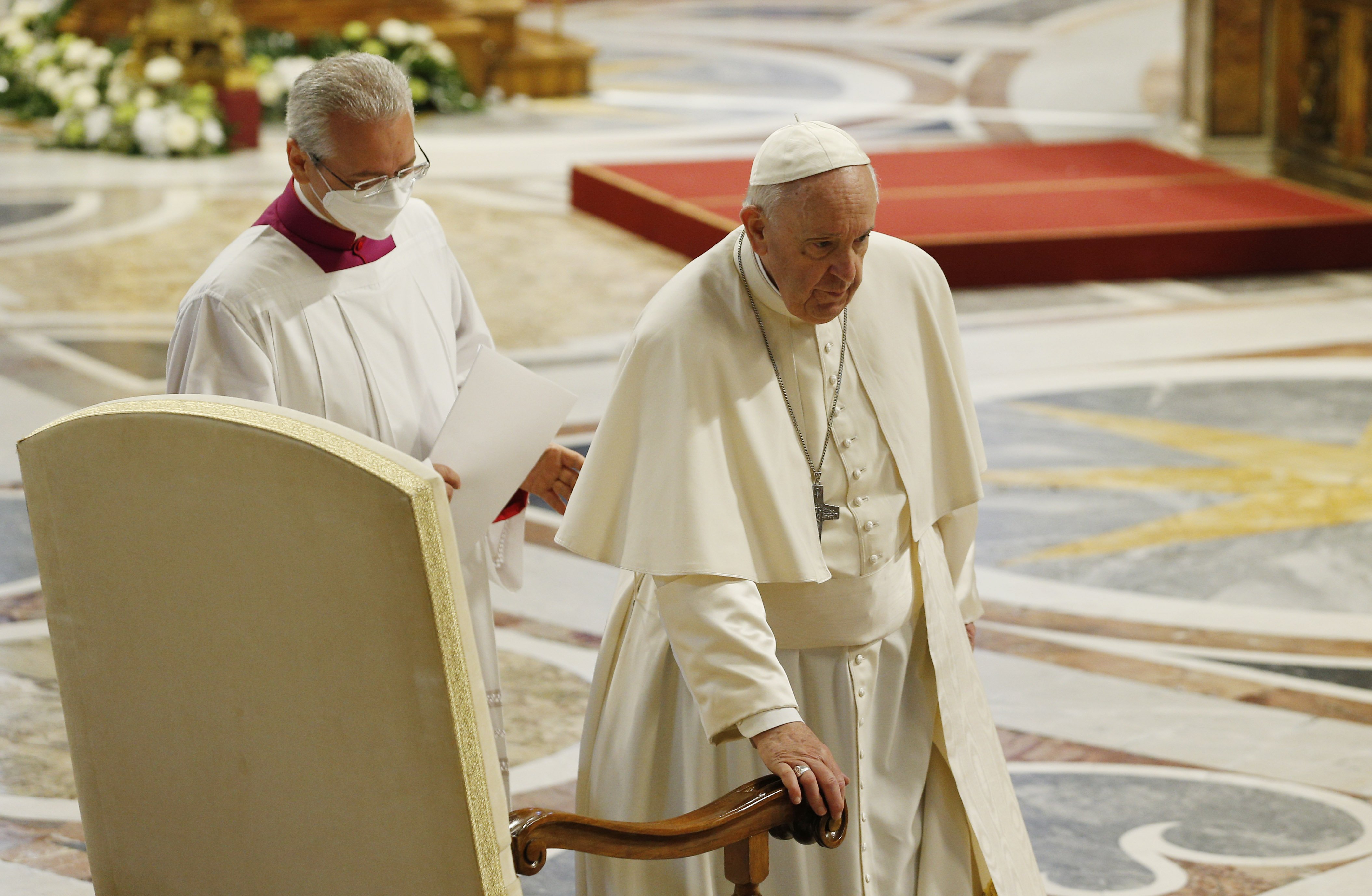 Pope Francis arrives at his seat as he participates in Mass marking the feast of Divine Mercy in St. Peter's Basilica at the Vatican April 24, 2022. (CNS photo/Paul Haring)