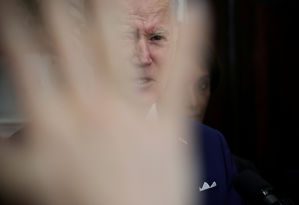 President Joe Biden takes questions from reporters at the White House May 4 in Washington, after delivering remarks on economic growth, jobs, and deficit reduction. (CNS/Reuters/Evelyn Hockstein)