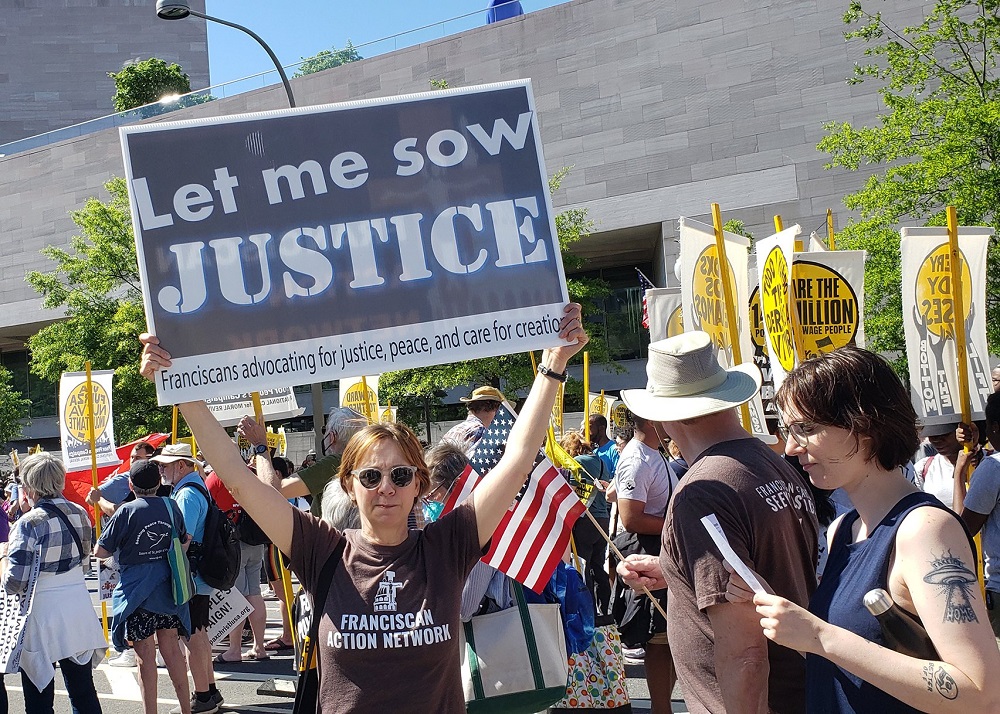 Members of Catholic groups take part in the Moral March on Washington on June 18 sponsored by the Poor People's Campaign. The Catholic contingent was organized by Network, a Catholic social justice lobby; the Leadership Conference of Women; the Sisters of