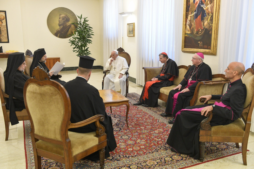 Pope Francis listens to Orthodox Archbishop Job of Telmessos while meeting a delegation representing the Ecumenical Patriarchate of Constantinople at the Domus Sanctae Marthae at the Vatican June 30 (CNS/Vatican Media)